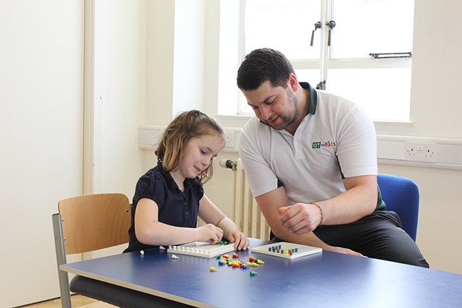 Child looking up not paying attention to the task